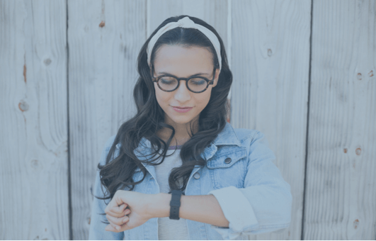 Woman checks her watch